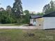 Charming house with well-maintained landscaping and an inviting outdoor space at 201 Harley St, Wadesboro, NC 28170