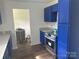 Kitchen showcasing stainless steel appliances, granite countertops, and painted cabinets at 201 Harley St, Wadesboro, NC 28170
