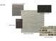 Selection of exterior finish materials including siding, brick, roof tiles, and front door paint samples at 2019 Puddle Pond Rd, Indian Trail, NC 28079