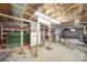 Unfinished basement space with visible pipes and exposed ceiling, offering potential for customization at 20337 Nc Hwy 73 Hwy, Albemarle, NC 28001