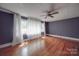 Spacious bedroom with hardwood floors, natural light, and neutral paint at 20337 Nc Hwy 73 Hwy, Albemarle, NC 28001