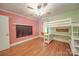 Spacious bedroom featuring a modern bunk bed with desk and hardwood floors at 20337 Nc Hwy 73 Hwy, Albemarle, NC 28001