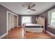 Bedroom featuring hardwood floors, closet and natural light at 20337 Nc Hwy 73 Hwy, Albemarle, NC 28001