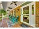 Inviting front porch with comfortable seating, ceiling fans, and a welcoming entrance at 2062 High Pines Rd, Rock Hill, SC 29732