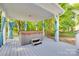 Covered hot tub on a wooden deck with privacy curtains at 2062 High Pines Rd, Rock Hill, SC 29732