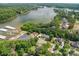 Stunning aerial view of the waterfront community with lake access and lush greenery at 216 Commodore Ct, Belmont, NC 28012