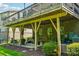 Outdoor patio with outdoor seating and a hot tub under the deck at 2254 Donnington Nw Ln, Concord, NC 28027
