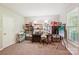 Bright craft room featuring a large work table, ample storage, and natural light from a window at 2254 Donnington Nw Ln, Concord, NC 28027