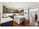 A well-designed kitchen with stainless steel appliances, a spacious island, sleek cabinetry, and bright countertops at 2254 Donnington Nw Ln, Concord, NC 28027
