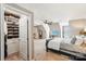 Main bedroom showcases a walk-in closet and neutral carpeting, offering comfortable living space at 2254 Donnington Nw Ln, Concord, NC 28027