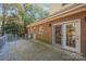 Back deck with sliding glass doors that overlook a wooded backyard at 2643 Rolling Hills Dr, Monroe, NC 28110