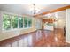 Bright dining area featuring tile flooring, large windows, and access to the kitchen at 2643 Rolling Hills Dr, Monroe, NC 28110