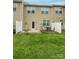 A spacious backyard features a patio area, lush grass, and a privacy fence, perfect for outdoor enjoyment and relaxation at 2752 Sawbridge Ln, Gastonia, NC 28056