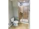 Clean bathroom featuring a shower, toilet, and tile flooring at 2752 Sawbridge Ln, Gastonia, NC 28056
