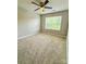 Bright bedroom with neutral carpet and a large window at 2752 Sawbridge Ln, Gastonia, NC 28056
