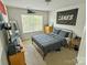 Cozy bedroom with natural light, featuring a black metal bed frame at 2752 Sawbridge Ln, Gastonia, NC 28056