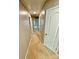Upstairs hallway with multiple doors and carpet flooring at 2752 Sawbridge Ln, Gastonia, NC 28056