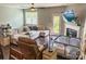Cozy living room featuring a plush sectional sofa, fireplace, ceiling fan, and hardwood floors at 2752 Sawbridge Ln, Gastonia, NC 28056
