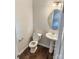 Cozy powder room with pedestal sink at 2752 Sawbridge Ln, Gastonia, NC 28056