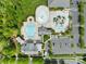 An overhead shot of the neighborhood pool and amenities, framed by lush trees and convenient parking at 3022 Oakmere Rd, Waxhaw, NC 28173