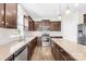 Kitchen features granite counters, stainless appliances and large island with breakfast bar at 3022 Oakmere Rd, Waxhaw, NC 28173