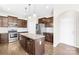Gourmet kitchen with stainless steel appliances, granite countertops, and island at 3022 Oakmere Rd, Waxhaw, NC 28173