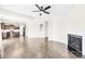 Spacious living room flows into the kitchen with hardwood floors and a cozy fireplace at 3022 Oakmere Rd, Waxhaw, NC 28173