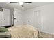 Spacious bedroom boasts a ceiling fan and three closets at 304 W Fourth St, Cherryville, NC 28021