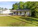Beautifully kept single-story house featuring a lovely front porch with a well-manicured lawn at 304 W Fourth St, Cherryville, NC 28021