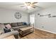 Comfortable living room with wood floors, ceiling fan, and a cozy atmosphere at 304 W Fourth St, Cherryville, NC 28021