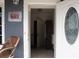 Entryway featuring an open door with decorative glass, a view of the interior, and visible exterior wall texture at 310 4Th W St, Newton, NC 28658