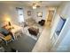Inviting living room featuring a ceiling fan and a mix of seating options and decor at 310 4Th W St, Newton, NC 28658