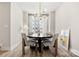Elegant dining room features a round table, stylish chairs, and a modern chandelier for inviting meals at 3223 Beans Blvd, Charlotte, NC 28203