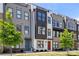 Contemporary townhome exteriors feature diverse colors, modern designs, and well-maintained landscaping for curb appeal at 3223 Beans Blvd, Charlotte, NC 28203