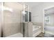 Tiled shower and soaking tub in a well-lit, modern bathroom with glass door at 338 Livingston Dr, Lancaster, SC 29720