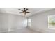 Bedroom with a ceiling fan, natural light from the window, and neutral carpeting at 338 Livingston Dr, Lancaster, SC 29720