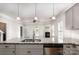 Stylish kitchen island with granite countertops and stainless steel dishwasher at 338 Livingston Dr, Lancaster, SC 29720