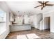 Open kitchen with modern gray cabinets, granite countertops, and stainless steel appliances at 338 Livingston Dr, Lancaster, SC 29720