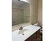 Bathroom featuring a tub and shower combination, white countertop, and a large mirror at 3498 Yorkland Dr, Hickory, NC 28601