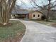 Charming one-story home with vinyl siding, well-manicured lawn, and a paved driveway at 3498 Yorkland Dr, Hickory, NC 28601