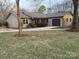 Charming one-story home with vinyl siding, well-manicured lawn, and a paved driveway at 3498 Yorkland Dr, Hickory, NC 28601