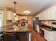 Well-appointed kitchen with granite countertops, custom cabinets, and modern stainless steel appliances at 3612 Woodnotch Ct, Charlotte, NC 28269