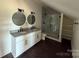Stylish bathroom features double vanity, granite countertops, and a glass-enclosed shower at 4034 Daugherty Rd, China Grove, NC 28023