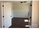 Neutral bedroom featuring wood floors, white trim, and a ceiling fan at 4034 Daugherty Rd, China Grove, NC 28023