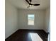 Comfortable bedroom with natural light and a ceiling fan at 4034 Daugherty Rd, China Grove, NC 28023