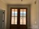 Stylish entryway featuring double doors with decorative glass inserts at 4034 Daugherty Rd, China Grove, NC 28023