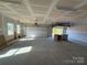 Spacious two-car garage with ample room for vehicles and storage, with installed garage door openers at 4034 Daugherty Rd, China Grove, NC 28023