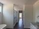 Hallway view highlighting a glass shower with modern fixtures and design at 4034 Daugherty Rd, China Grove, NC 28023