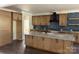 Beautiful kitchen with granite countertops, custom cabinets, and a large island at 4034 Daugherty Rd, China Grove, NC 28023