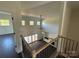 Open living room features a soaring ceiling, shiplap accent wall, and large sliding glass doors at 4034 Daugherty Rd, China Grove, NC 28023